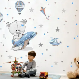 INSPIO chlapecká samolepka na zeď - Medvídek s modrým letadlem